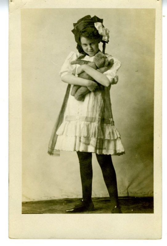 1920 RPPC Postcard Girl hugging Teddy Bear  